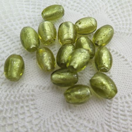 Ovala glaspärlor guld