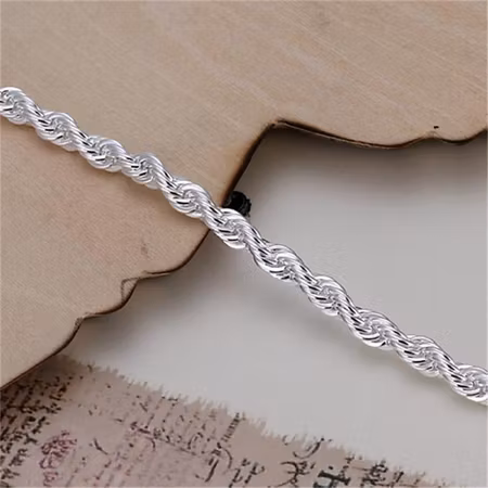 Silverpläterat snurrat armband