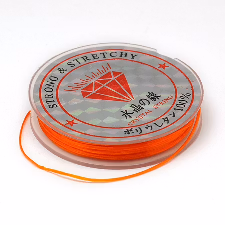 Färgad Elastisk nylontråd på rulle 0,6mm Mörk orange