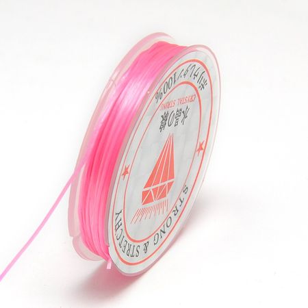 Färgad Elastisk nylontråd på rulle 0,6mm Rosa