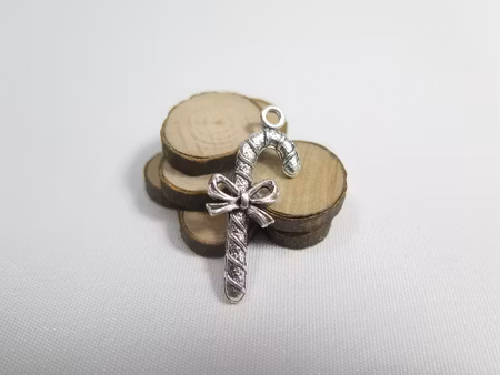 Charms - Berlock - Käpp med rosett - antik silver