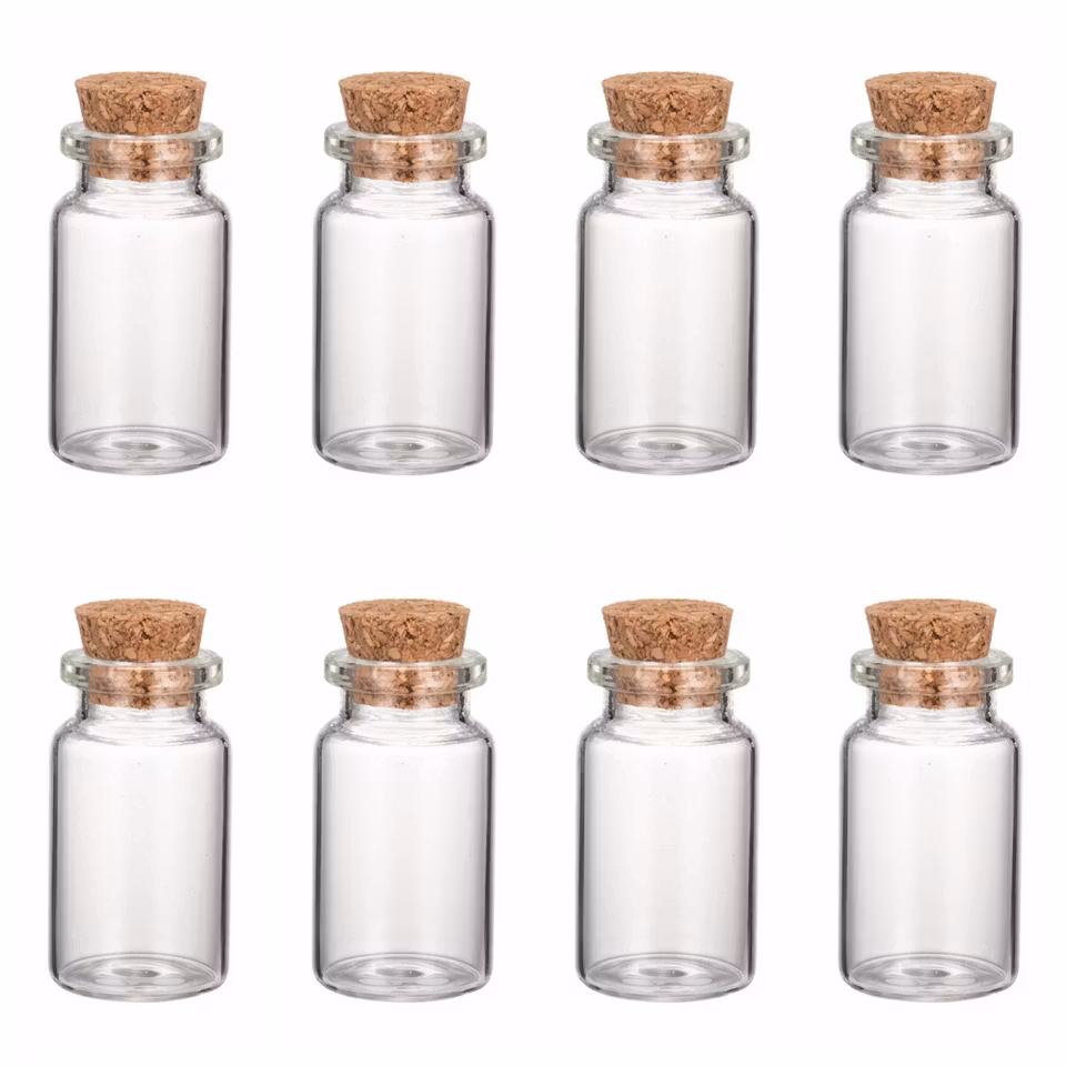 Liten glasflaska med kork