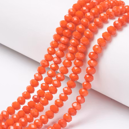 Facetterad glaspärla rondell - 6x5mm - orange röd - sträng - ca 90st