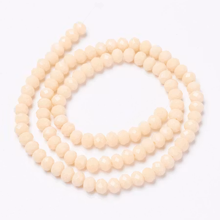 Facetterad glaspärla rondell - 4x3mm - antik vit - sträng - ca 130st