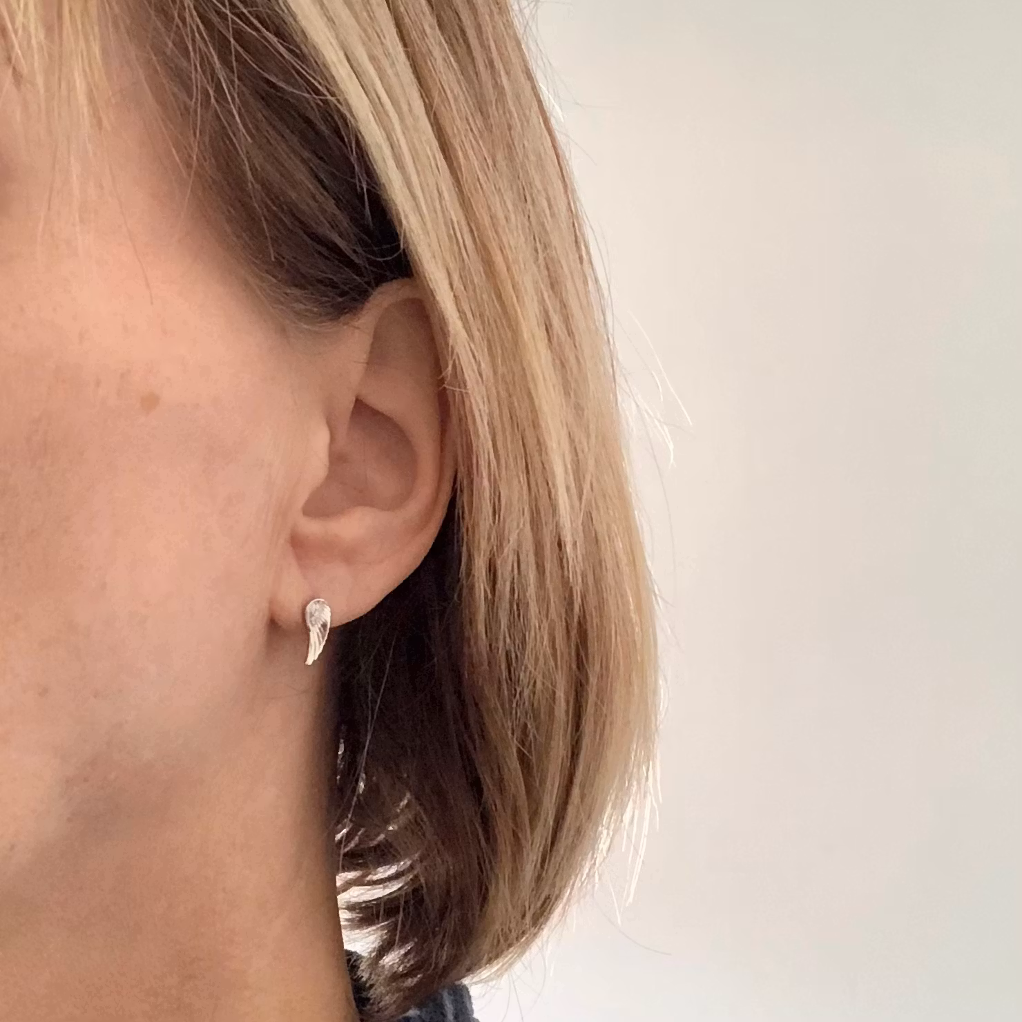 Set med änglavingar hänge och örhängen