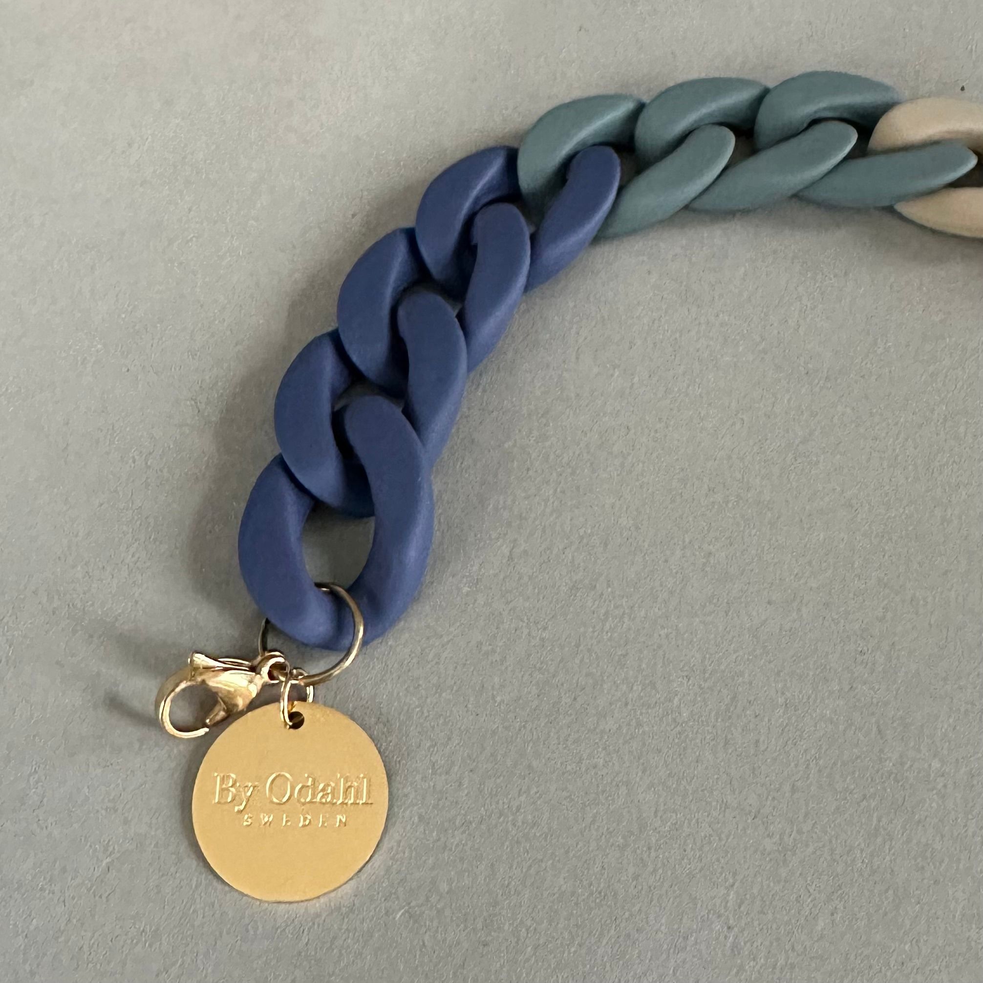 Armband i beige/petroleum/blå