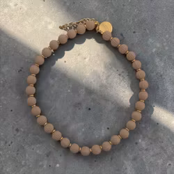 Kulhalsband i sand-beige