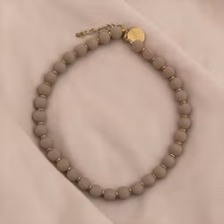 Kulhalsband i sand-beige
