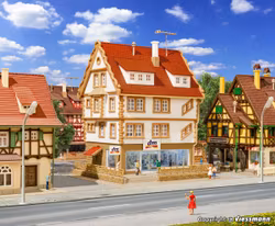 VO47664 - Stadshus med butik - Vollmer N