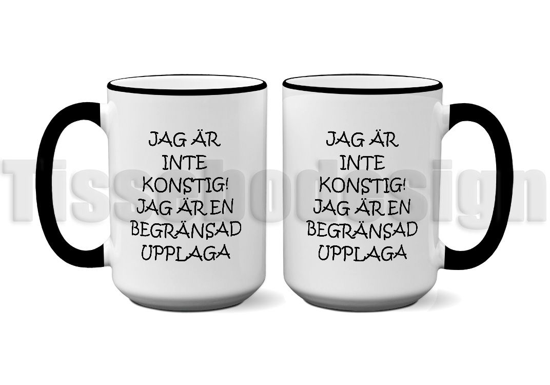 En vit 450 ml mugg med svart kant och svart handtag, tryckt med texten  Jag är inte konstig! jag är en begränsad upplaga
