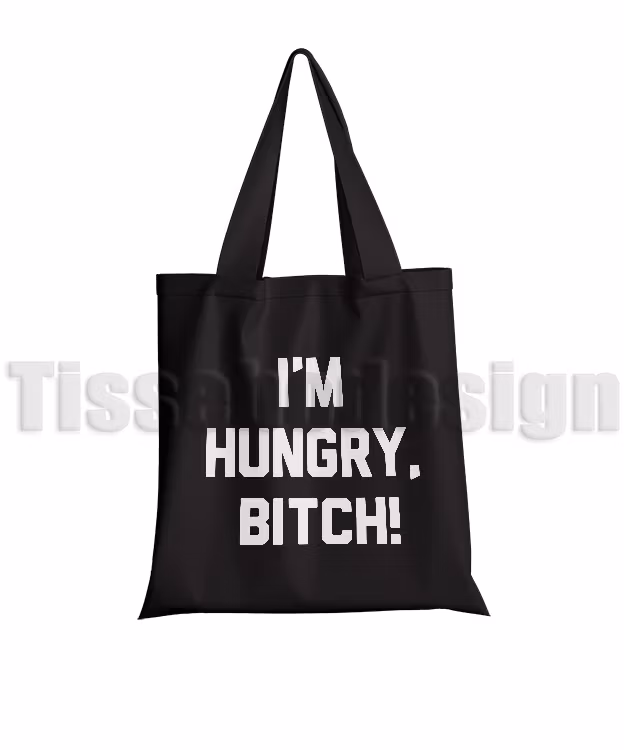 Bilden visar en svart tygväska med Tryck I´m Hungry Bitch i vit text