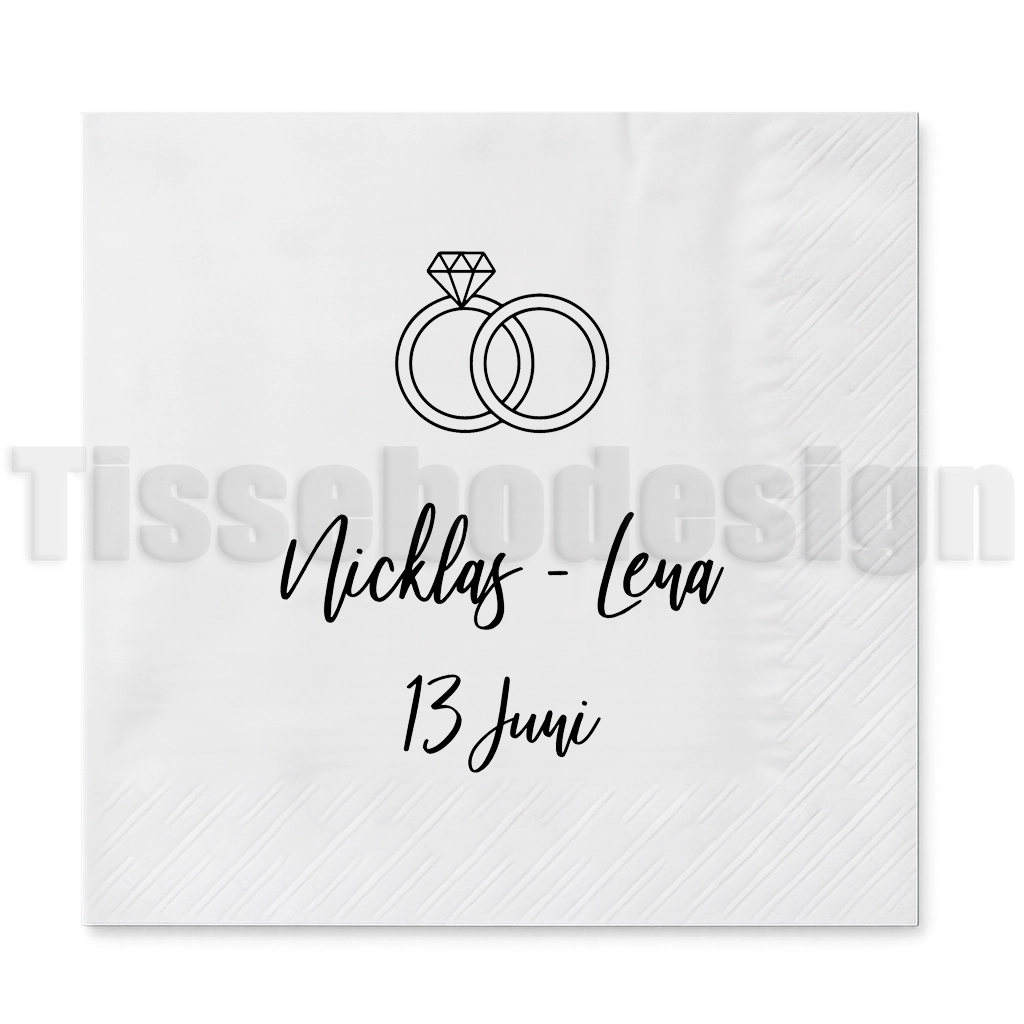 Servett med vigselringar, namn och datum för bröllop