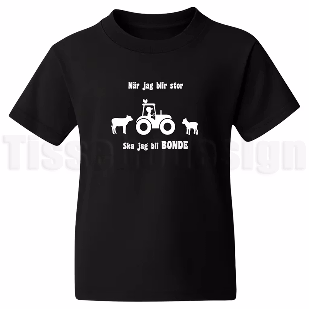 T-shirt med texten När jag blir stor ska jag bli bonde samt traktor, ko och får – pojkmotiv