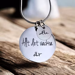 Graverat smycke Allt det vackra