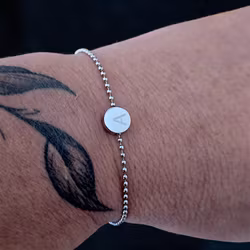 Graverat armband Coin