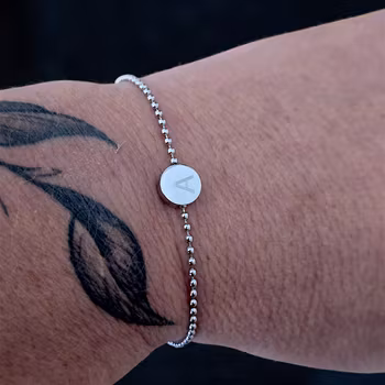 Graverat armband Coin