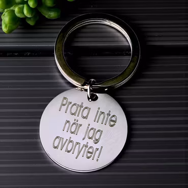 Nyckelring " Prata inte"