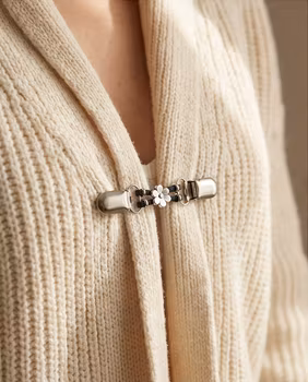 Koftaspänne med blomma