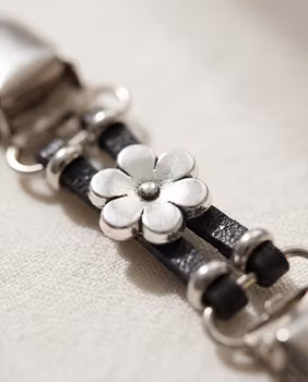 Koftaspänne med blomma