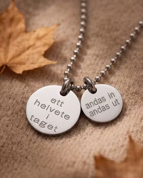 Graverat halsband " ett helvete i taget"