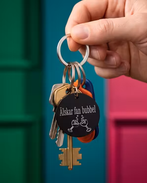 Nyckelring " Älskar fan bubbel - svart