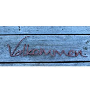 Välkommen skylt