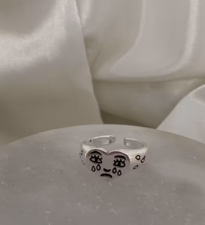 Crying heart ring