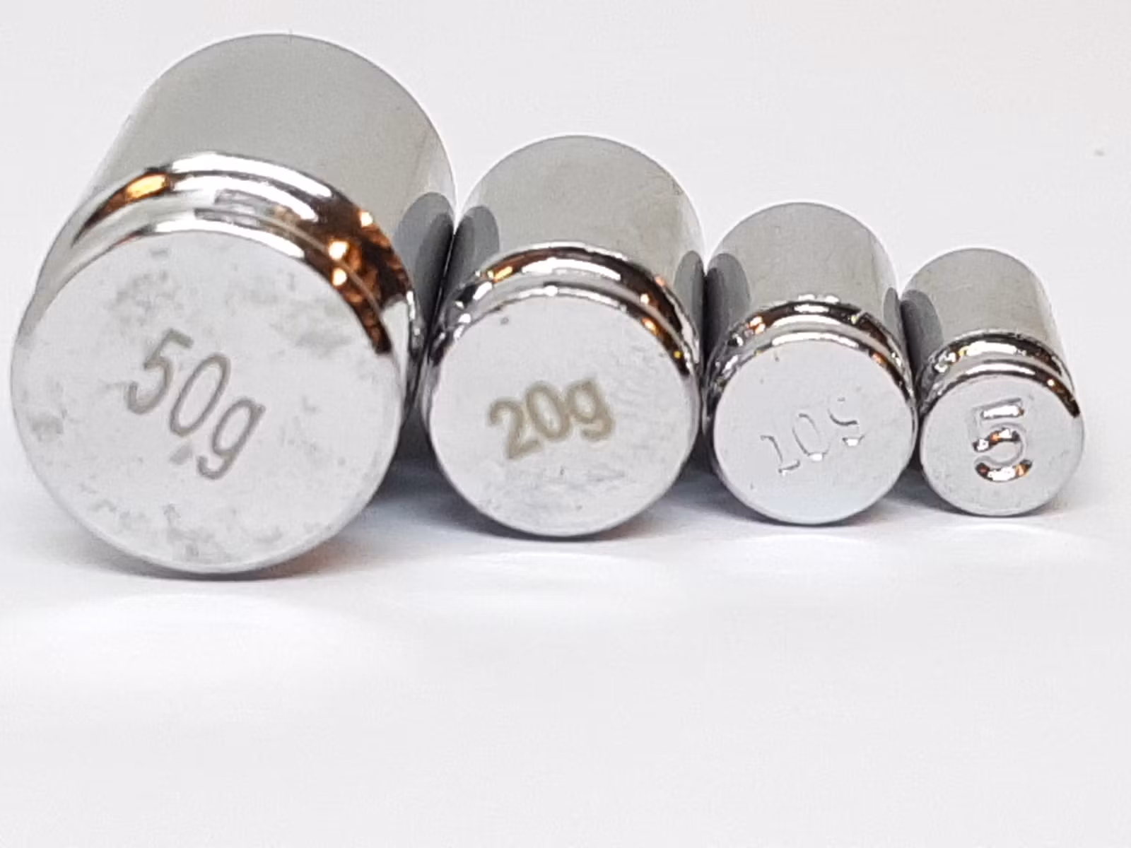 Vikter: 5 + 10 + 20 + 50 gram (4 stycken)