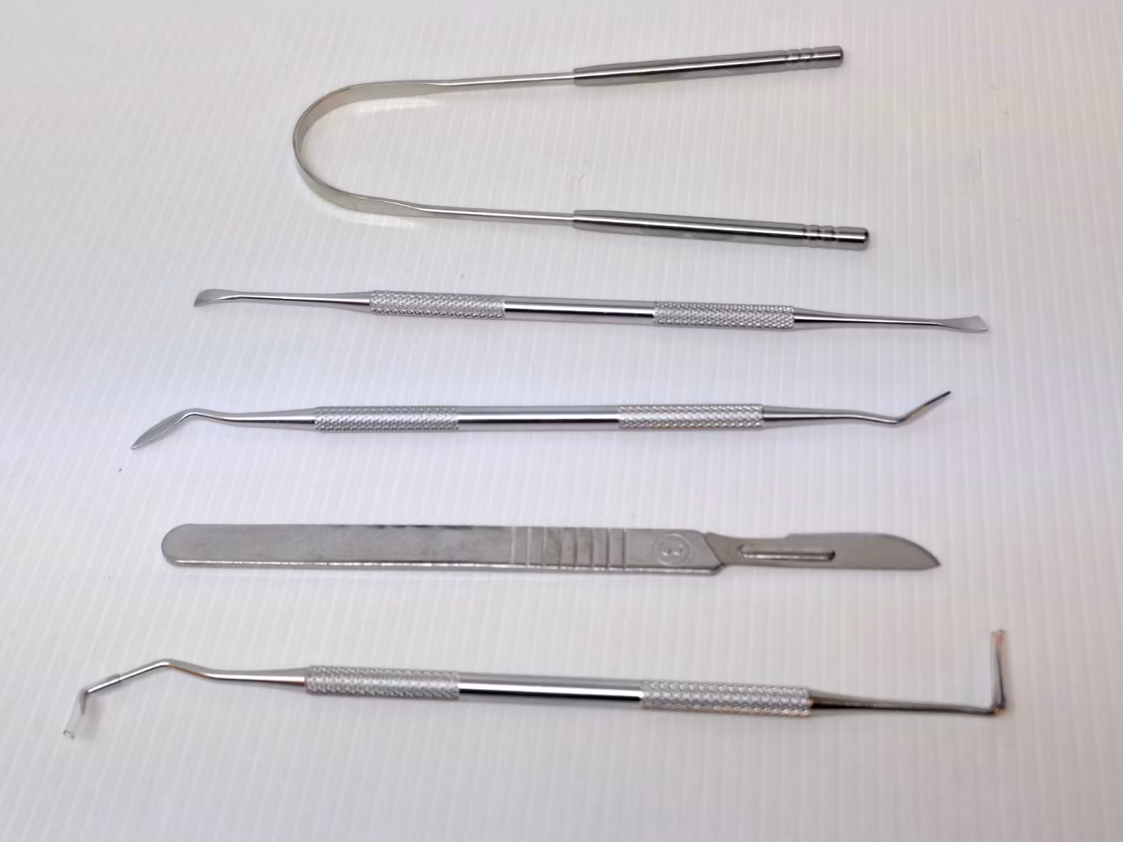 Set med 11 stycken verktyg (Tandläkare)