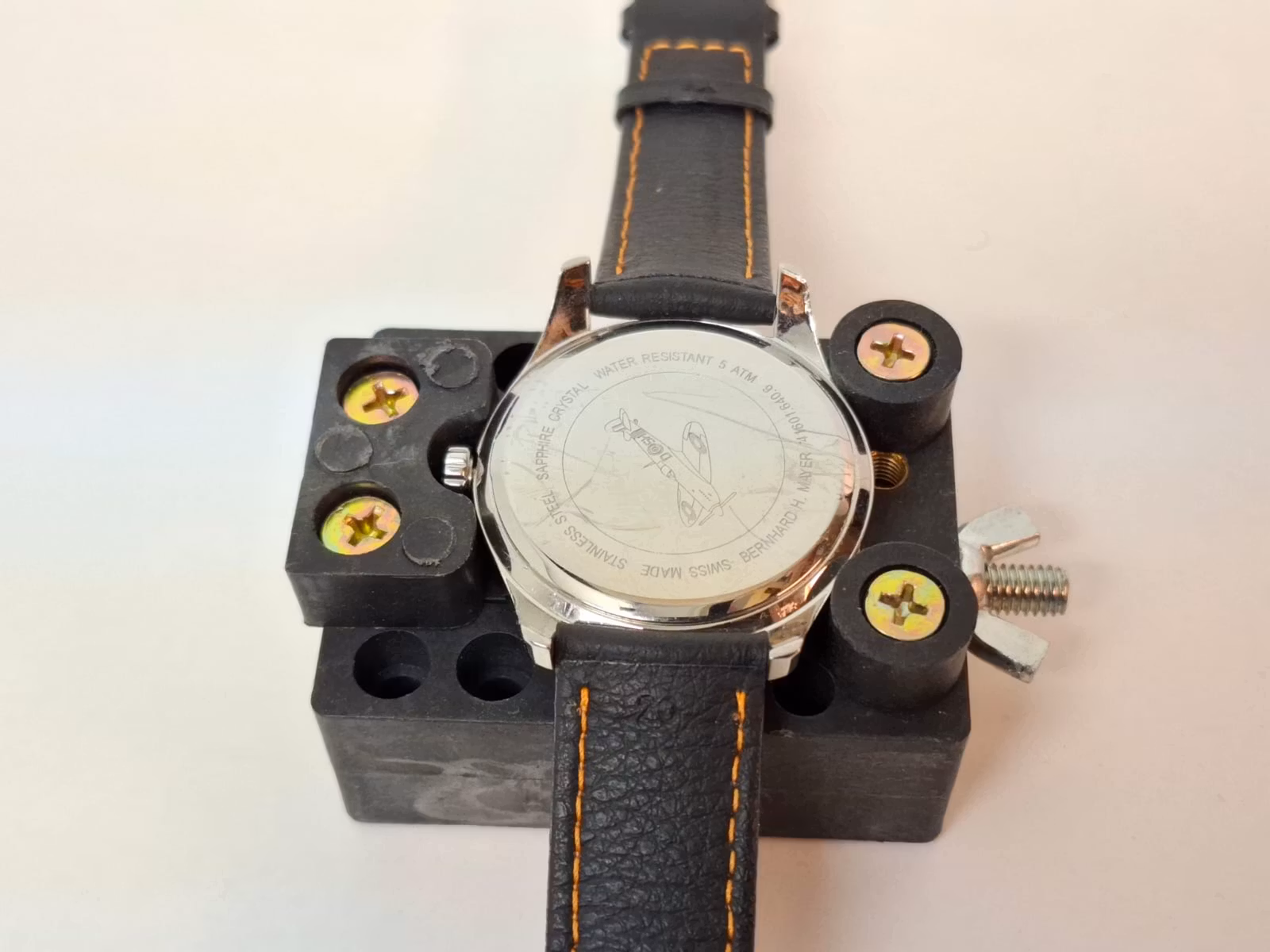 7 boettöppnare + 1 skruvstäd (klockverktyg)