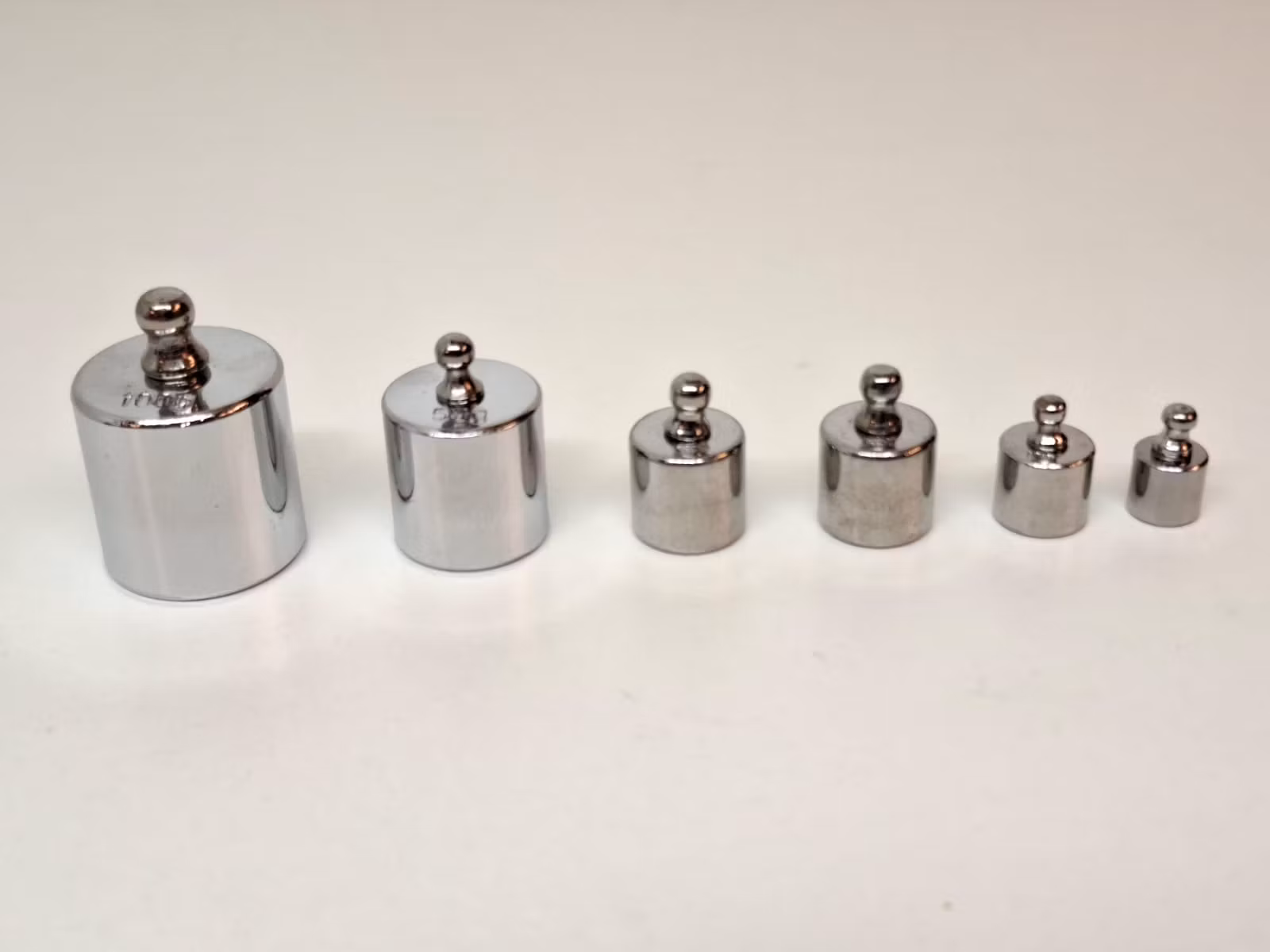 Set med 6 vikter (från 5 - 100 gram)