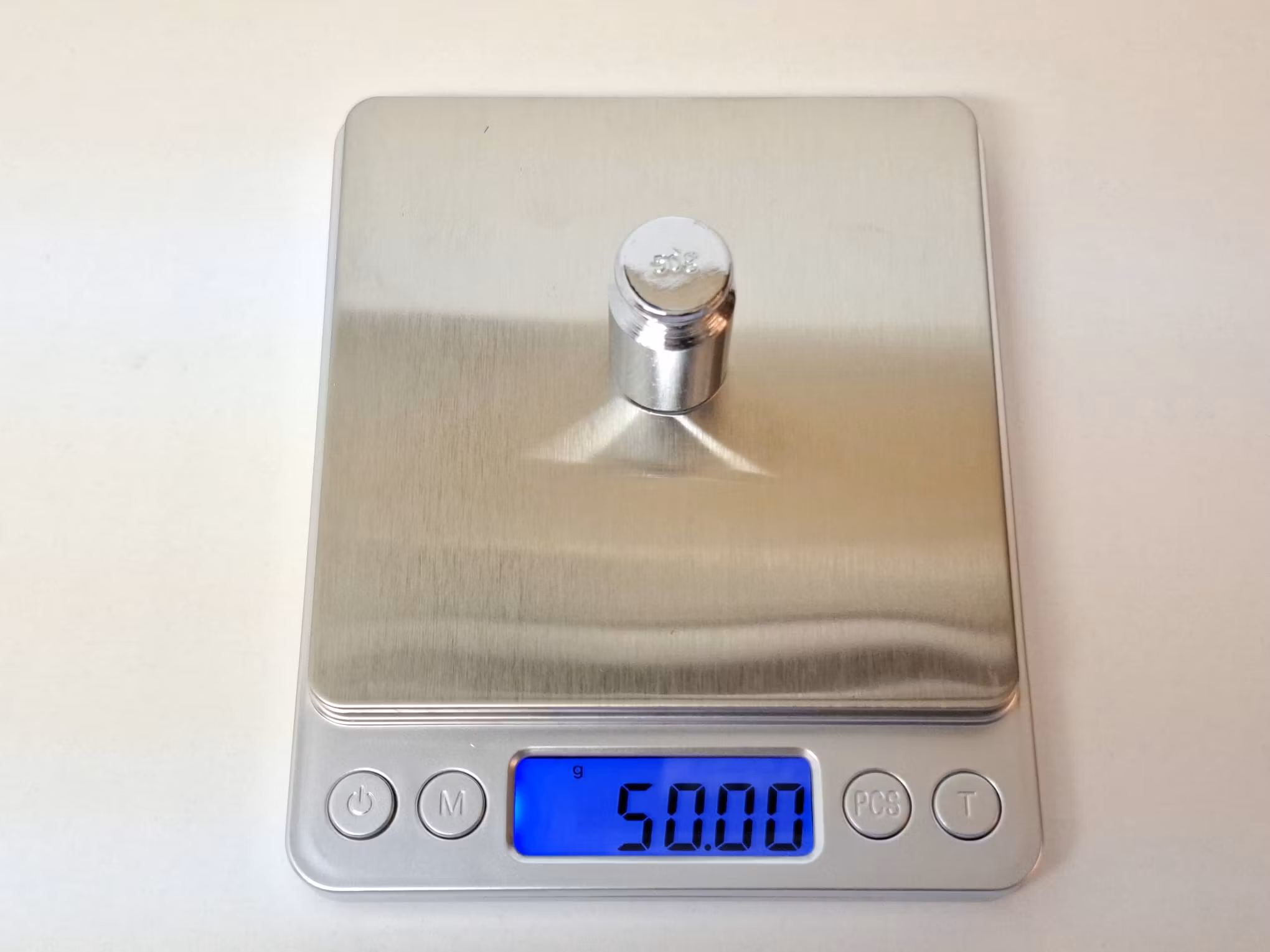 Digitalvåg (500 / 0.01 gram) + Vikt (50 g)