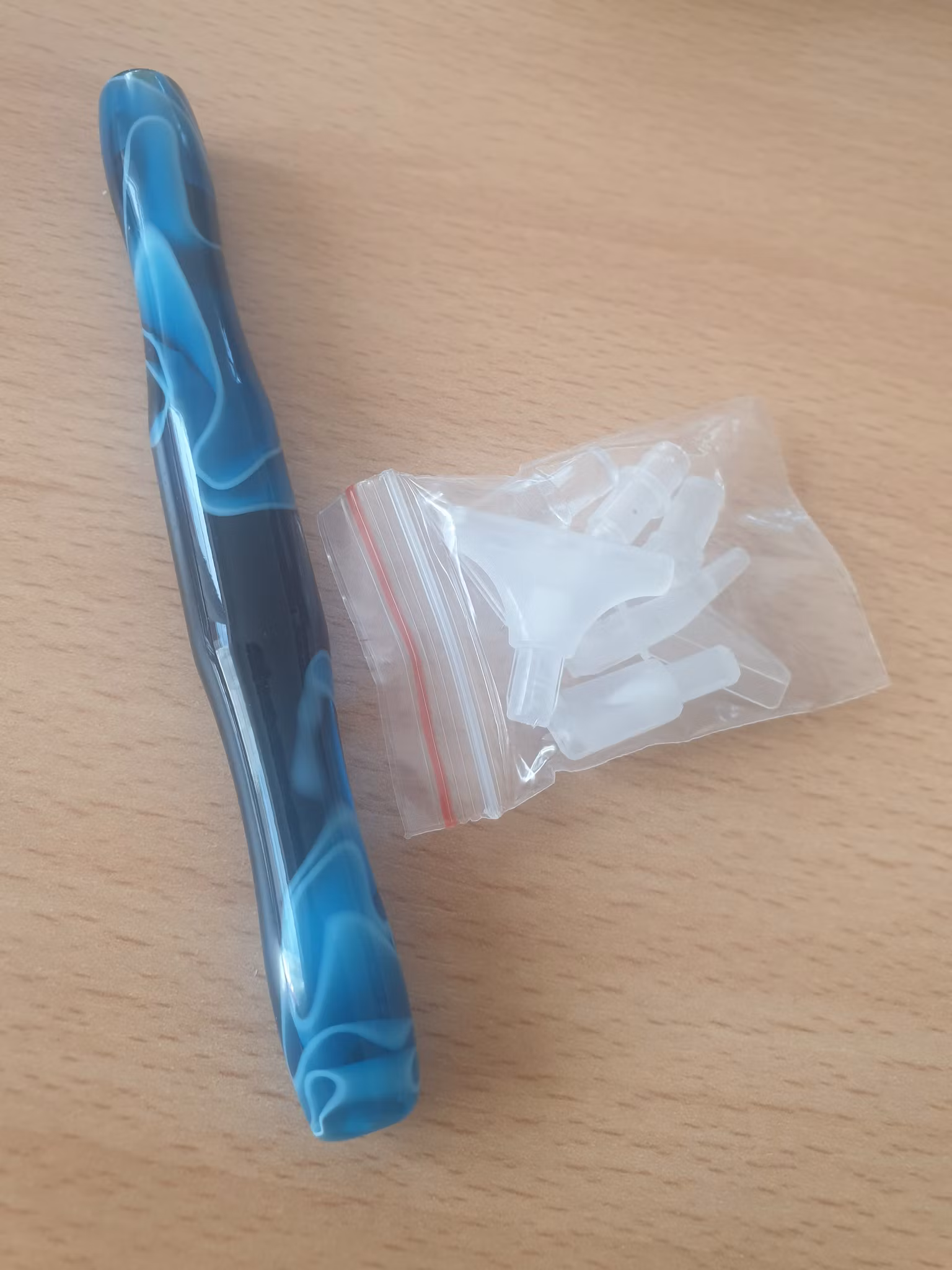 Penn med plast tupper