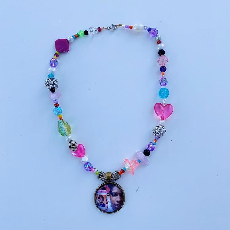 We look nothing alike Charm Necklace