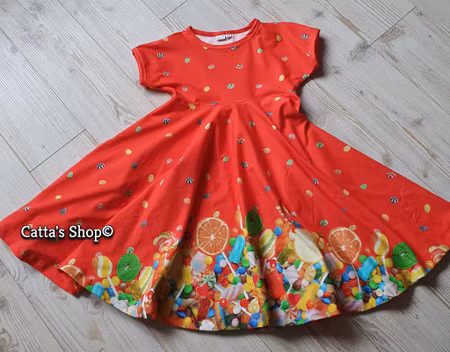 Snurrklänning med godis och klubbor - Ekologisk