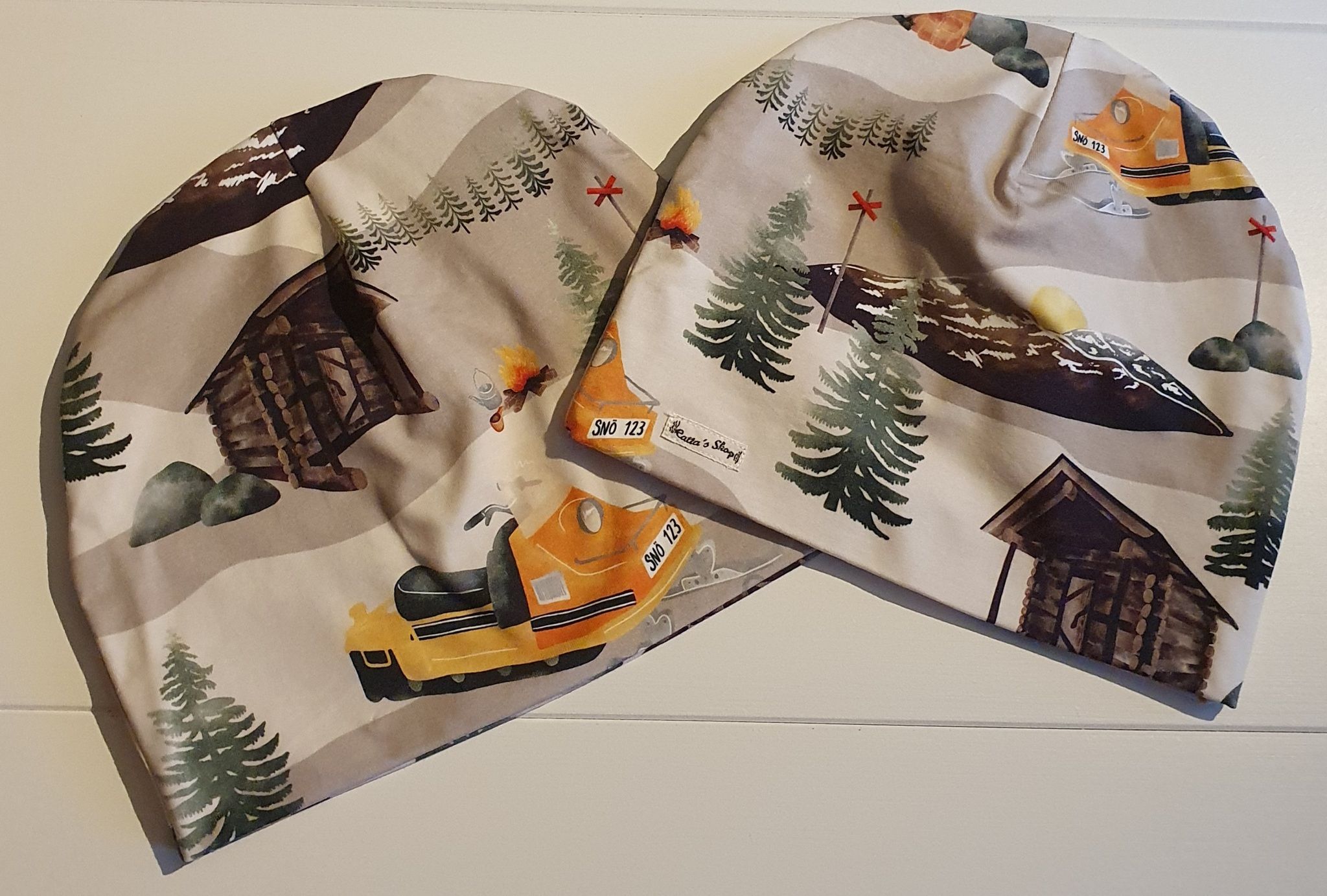 Mössa trikå, motiv Ockelbo snöskoter