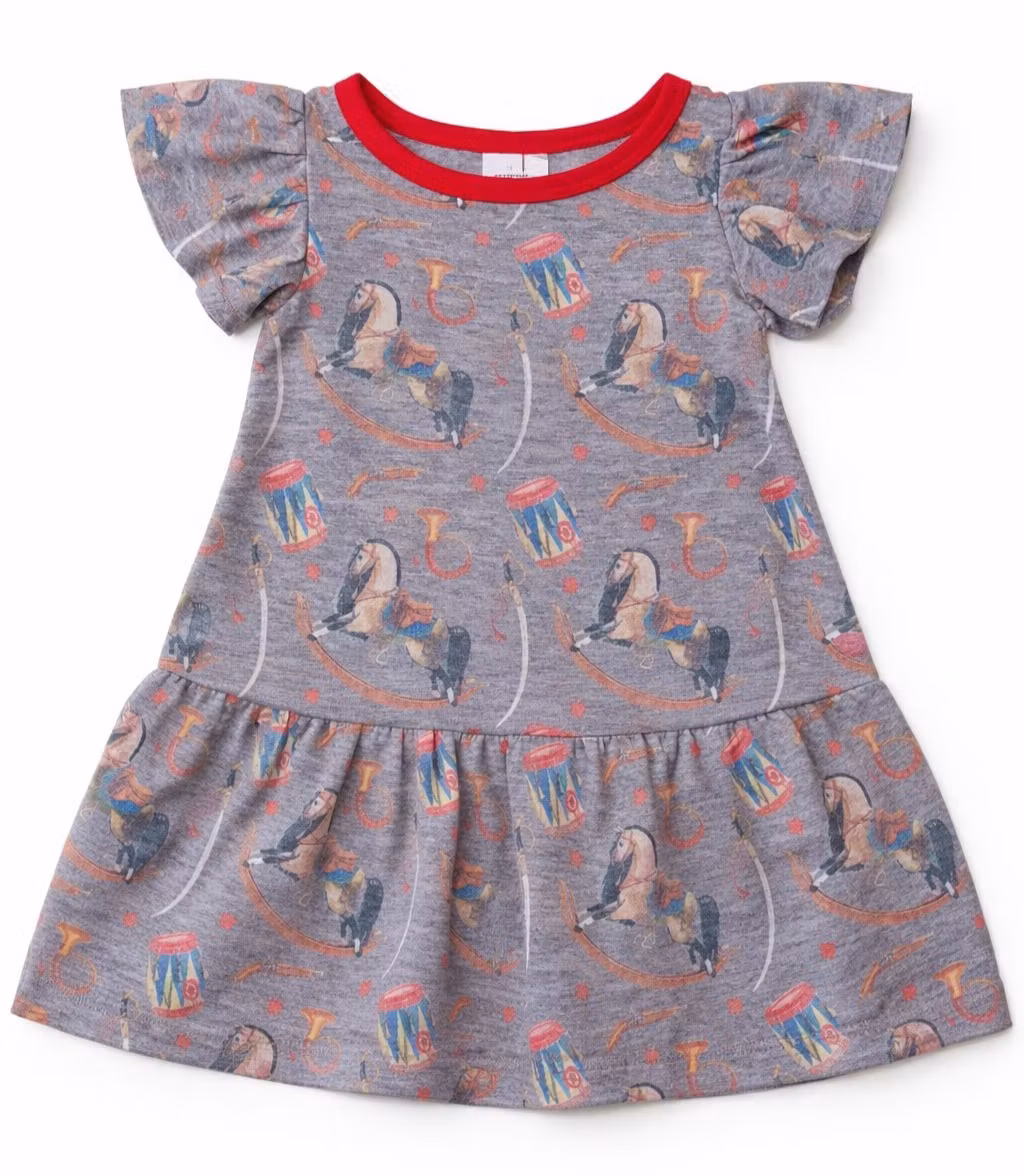 Klänning med gunghästmotiv - ekologisk