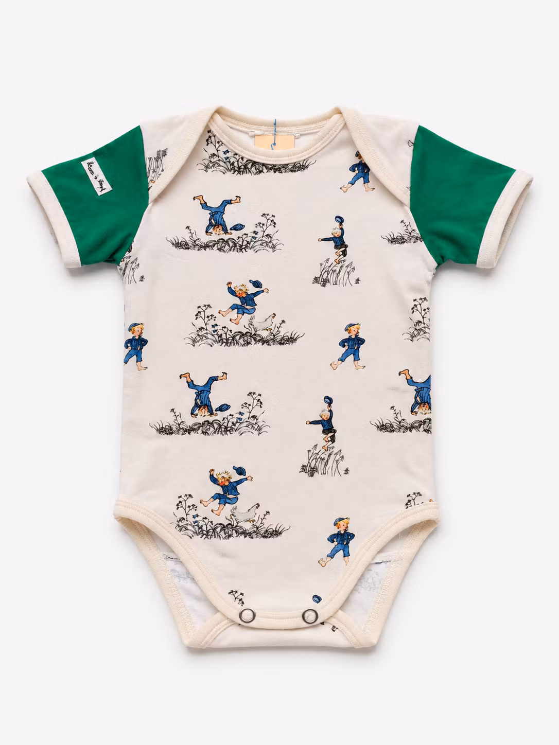 Babybody GLÄDJESKUTT i sommarmiljö