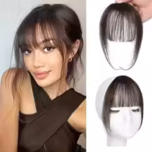 Lugg i äkta hår med clips