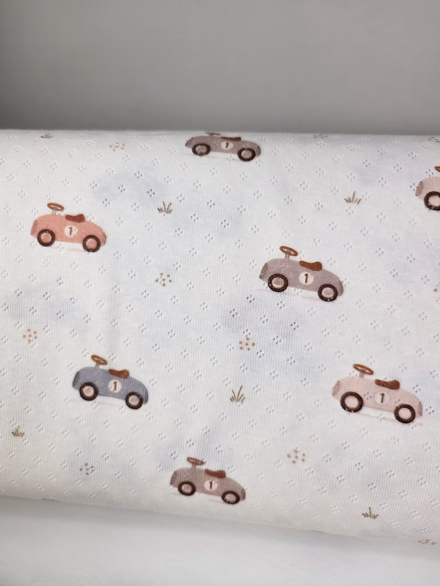 Toy car pointelle