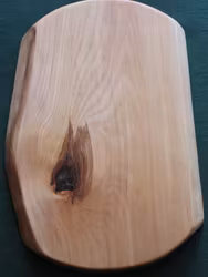 Unik liten björkskärbräda med svängda kortsidor 31x21 cm