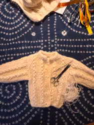 Barnkofta i ull ca 4-5 mån.