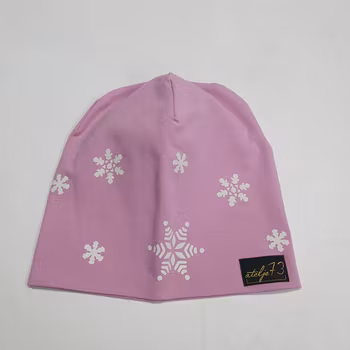 Reflexmössa rosa med vita snöflingor storlek 52