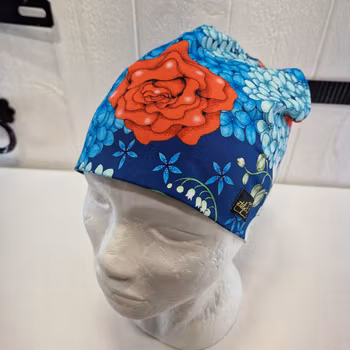Mössa blommor blått