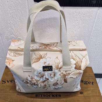 Mellan necessär vintage blommor
