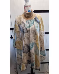 Poncho löv med beige krage