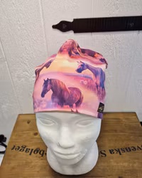 Mössa hästar i rosa