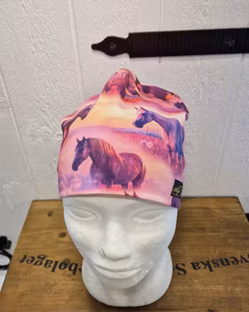 Mössa hästar i rosa