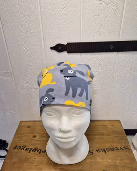 Mössa hundar i grått