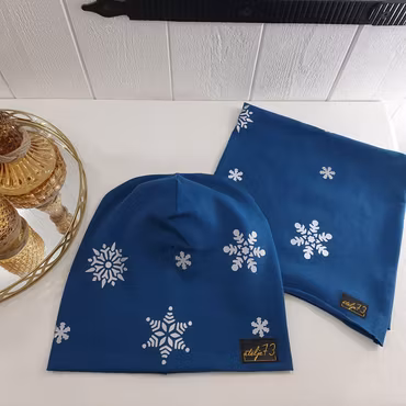 Reflexmössa snöflingor storlek 48-64